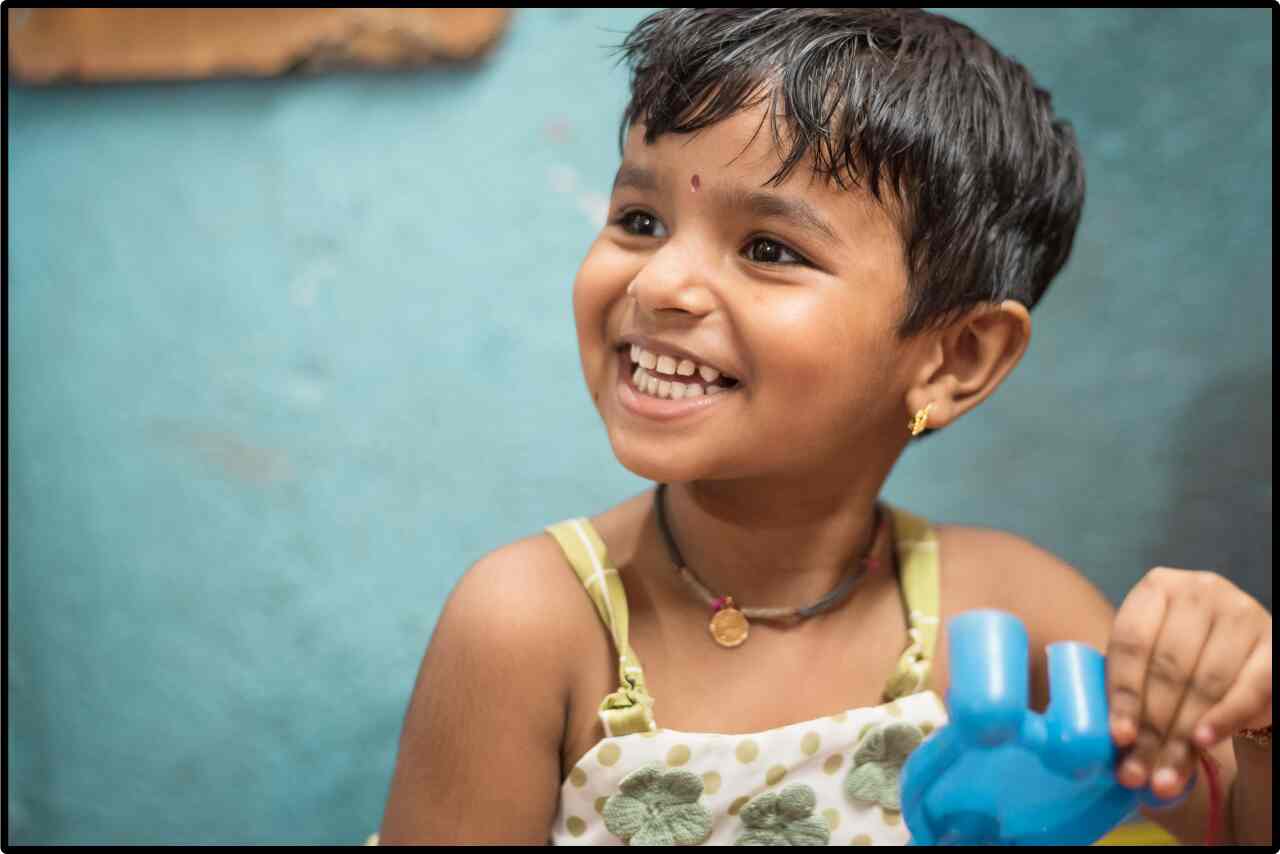 Happy kid laughing and having fun during playtime